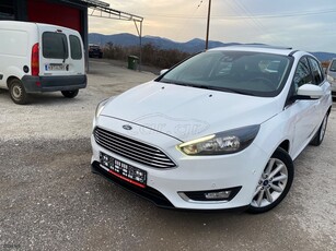 Ford Focus '15 Titanium, limo,ηλιοροφή, clima , book service , parktronic , keyless